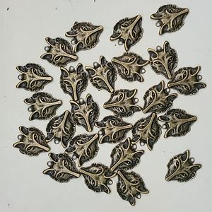 Lot of 25 Wolf Charms